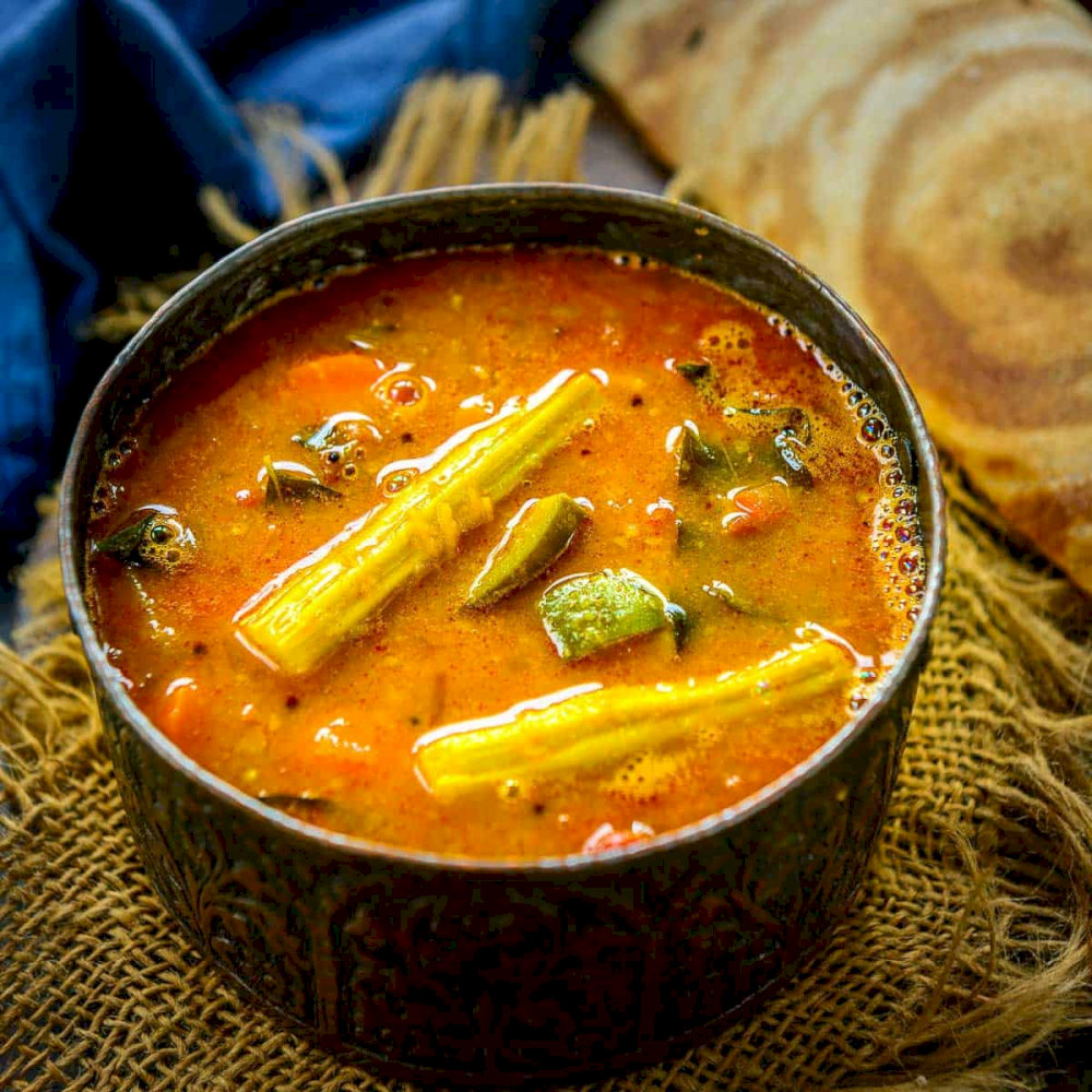 Sambar is typically served with dosa, idli, or rice. It can also be used as a dip for vadas or as a side dish to accompany any South Indian meal 